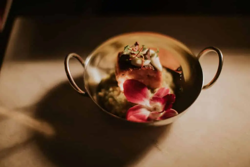 Small Plate Station Meal of our pesto risotto with plank seared salmon.