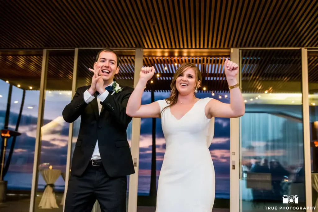 The bride and groom make their Grand Entrance back into the party after pictures.