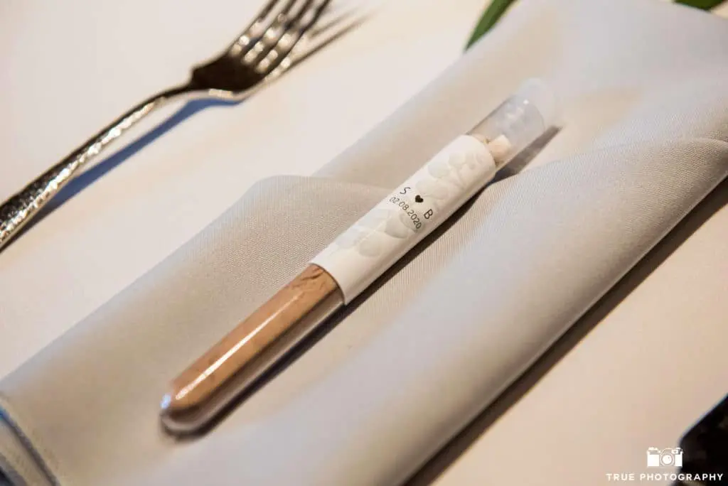 As a "thank you" to their guests, the love birds gave everyone a vial of hot cocoa mix to take home.