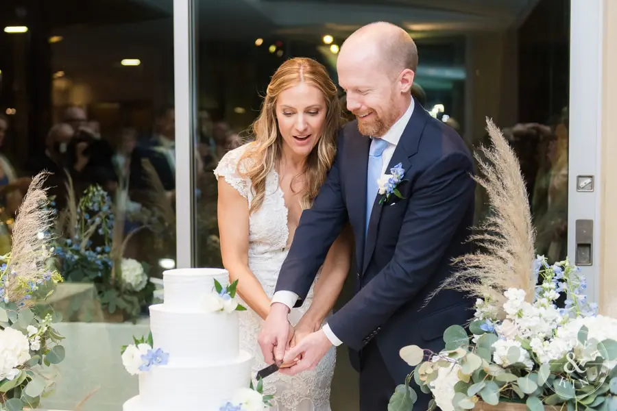 Bride and Groom cut cake