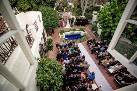 Darlington House wedding ceremony setup on the tiled pool patio