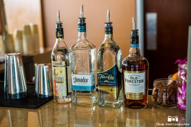 Bottles lined up at San Diego wedding bar