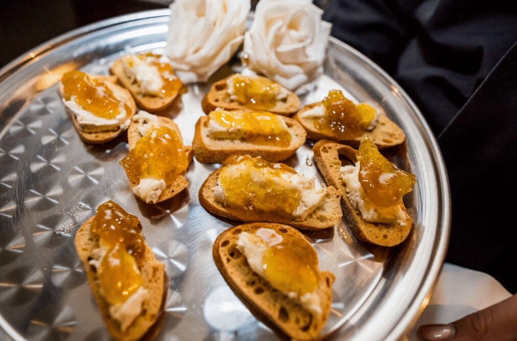 Honey ricotta crostini with fig and pear, a sweet-savory office party snack