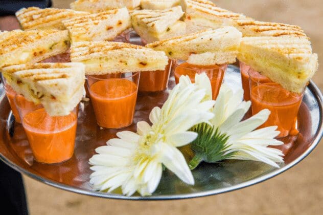 Spinach and artichoke grilled cheese office party snack bites with tomato bisque dip