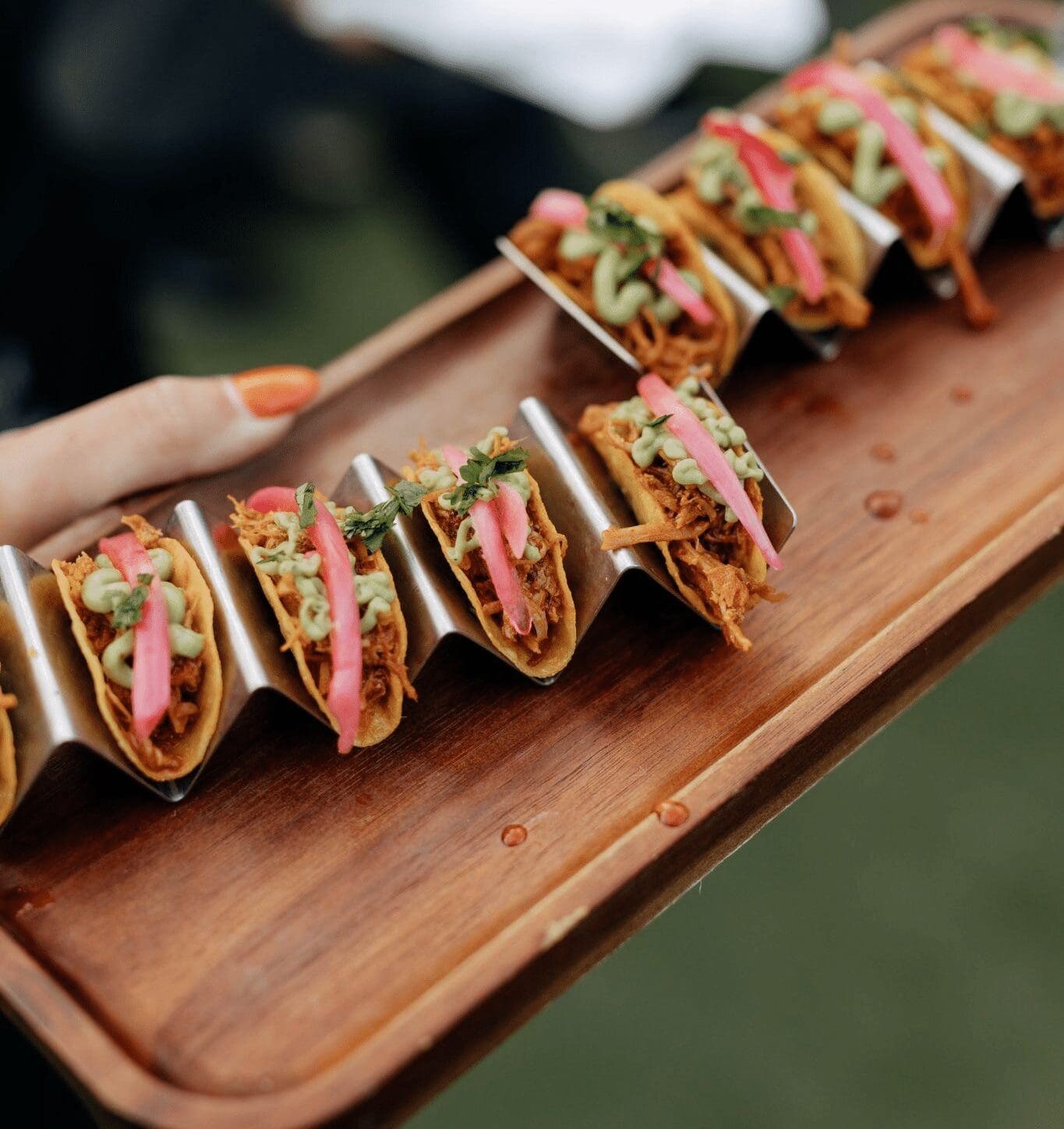 Mini tacos served as passed hors d’oeuvres for holiday party catering by Personal Touch Dining