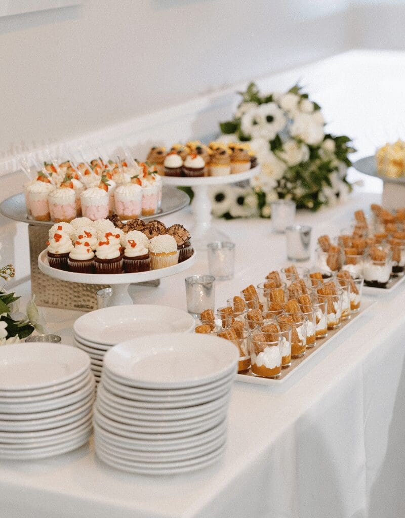 Wedding dessert table with mini cupcakes and churro parfaits, Personal Touch Dining wedding catering in San Diego